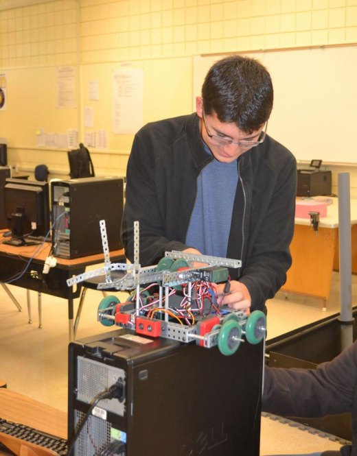 Conor Shortnacy tends to his robotics project and hopes for a career in engineering.